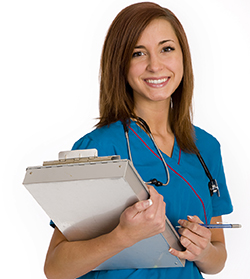 Woman wearing scrubs and a stethoscope holding a clipboard.